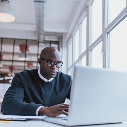 Man looking at a computer screen