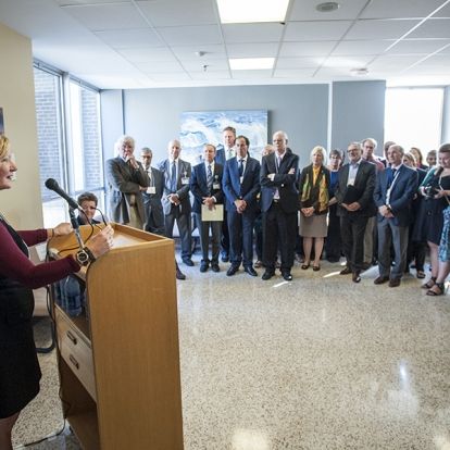 Patient and Research Participant Andra Fawcett speaks during the grand opening