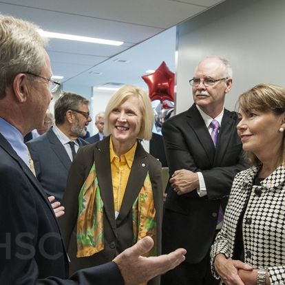 KHSC VP Roger Deeley leads a tour of the new centre for Dr. Roseann Runte, CEO of CFI, Dr. John Fisher Interim Vice Principal (Research) at Queen's University and City Councillor Laura Turner