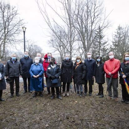 Current and past members of the KHSC community come together in City Park to mark the fifth anniversary of KHSC.