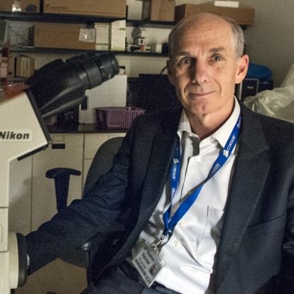 Dr. Vanner at the microscope