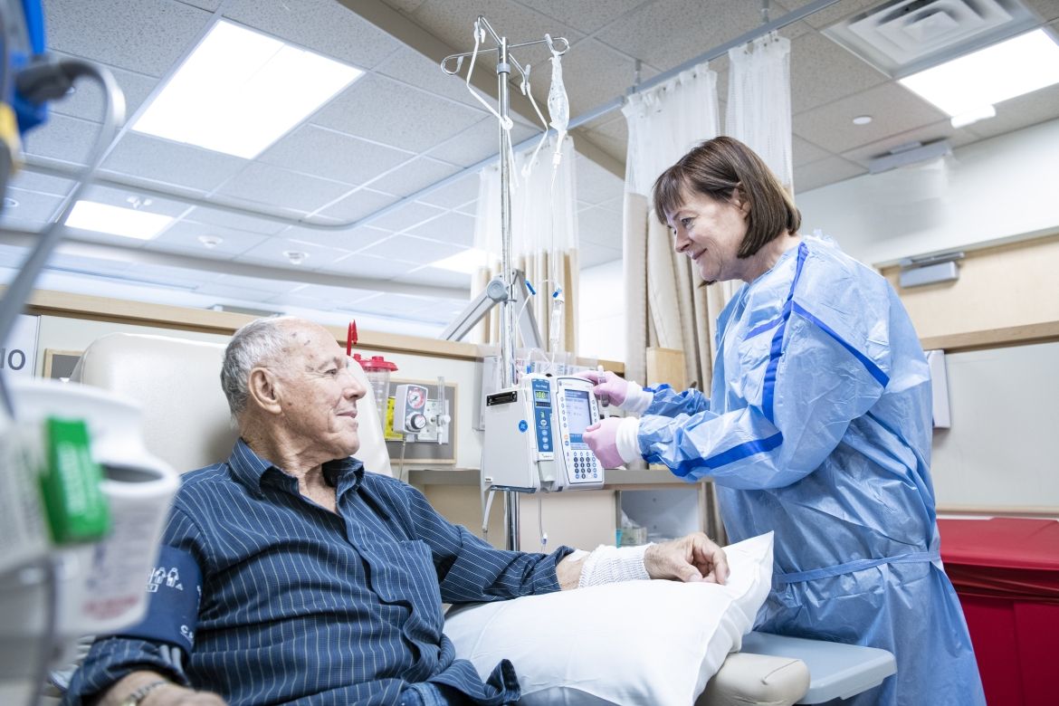 A KHSC nurse speaking with a patient