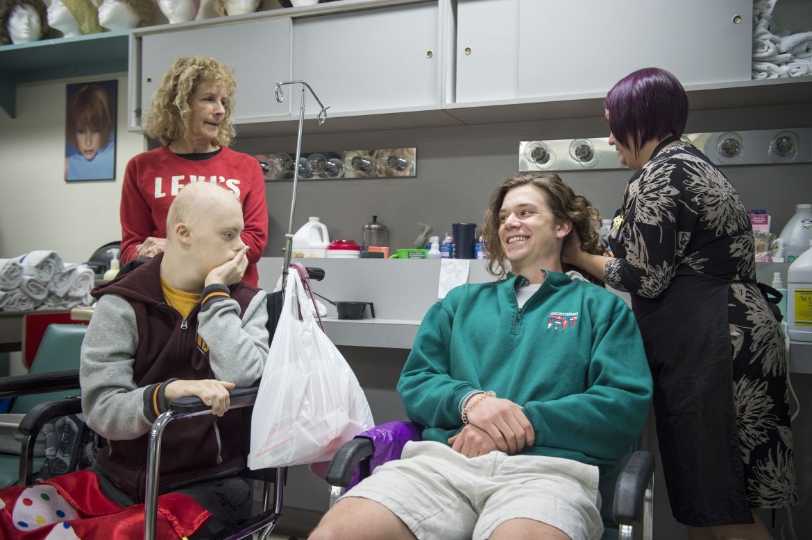 Getting hair prepped for the fateful cut