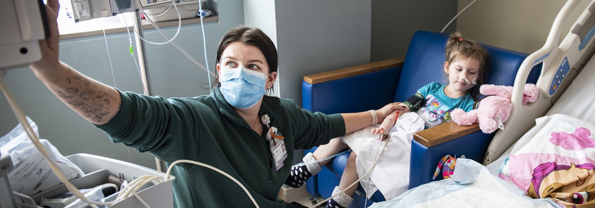 Nurse delivers care to a young patient