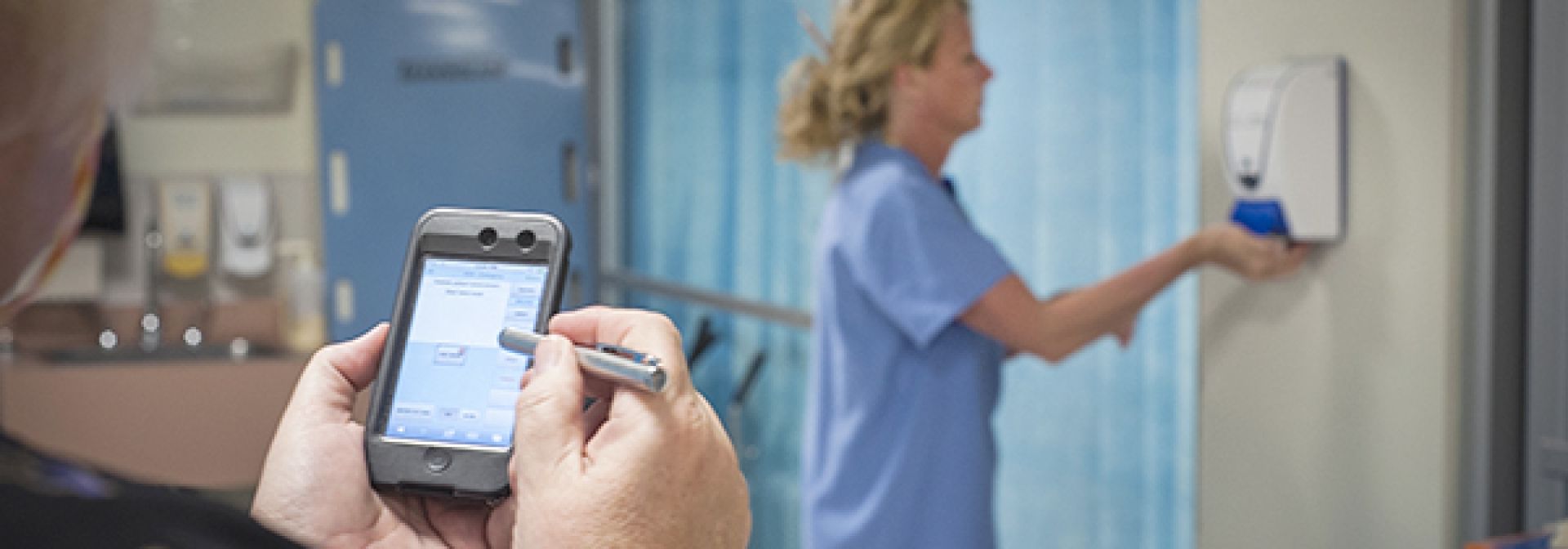 A unit manager conducting a hand hygiene audit.