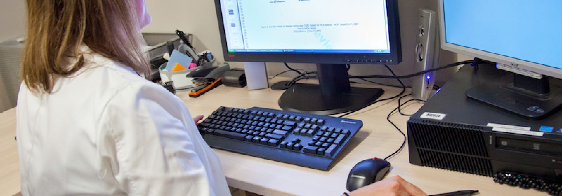 Dr. Flemming looking at results