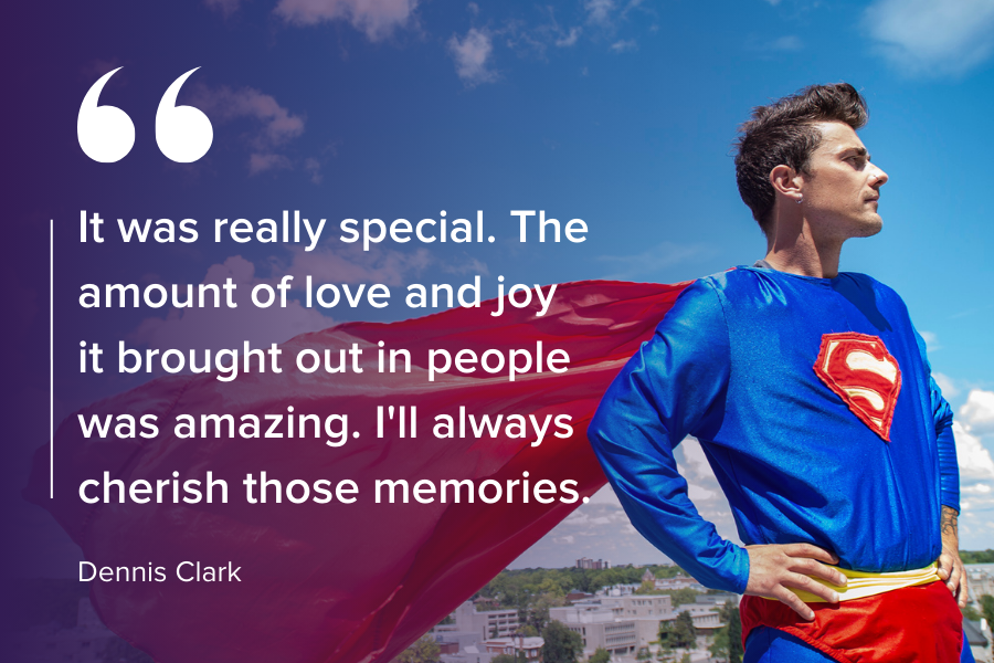 Dennis Clark is pictured standing on the roof at the KGH site. He’s dressed head to toe as Superman, with a long red cape.