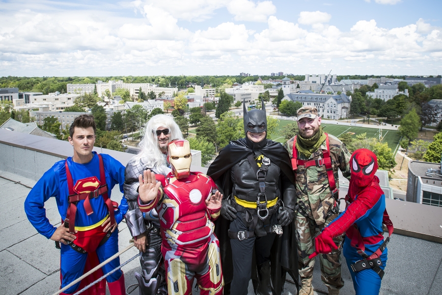 Dennis Clark is pictured standing on the roof at the KGH site. He’s dressed as Superman and is pictured alongside other superheroes including Batman, Spiderman, Thor, and Ironman.