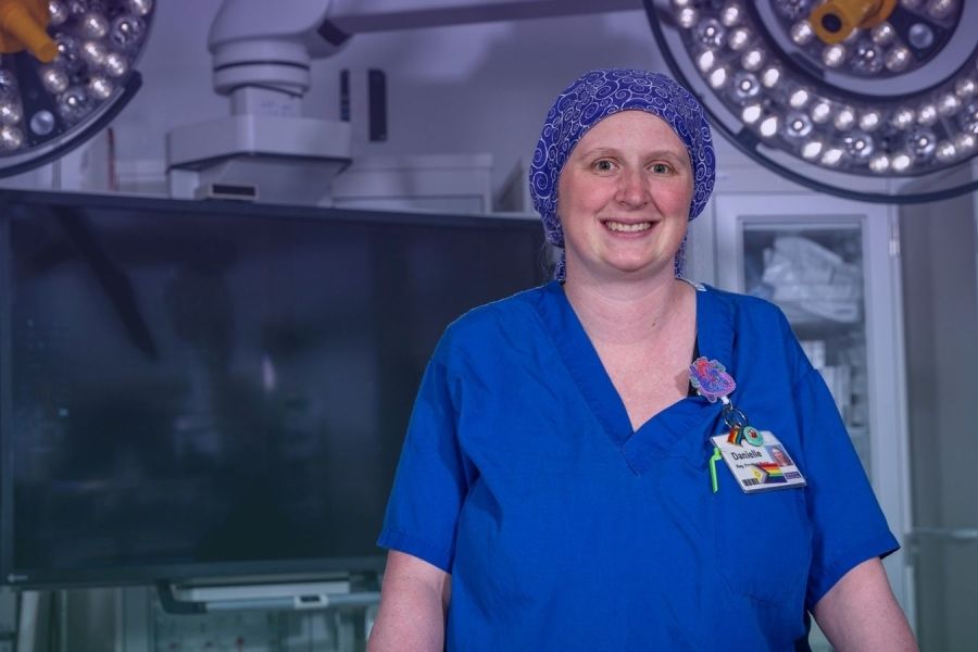 a scrub nurse in an operating room