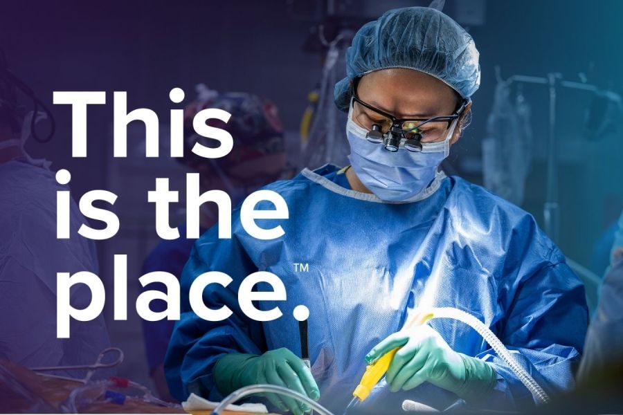 A physician performing surgery