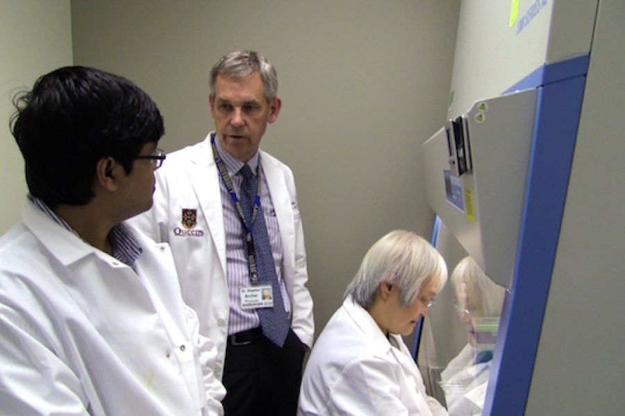 Dr. Archer with his colleagues in the lab