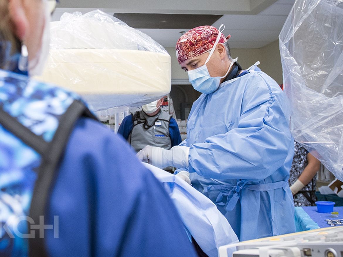 large interprofessional stroke care team working in the OR
