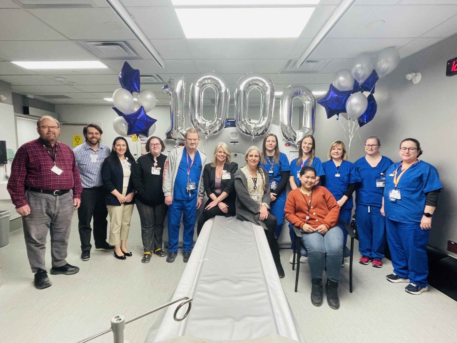 Members of the imaging team celebrate KHSC's 1,000 PET-CT scan