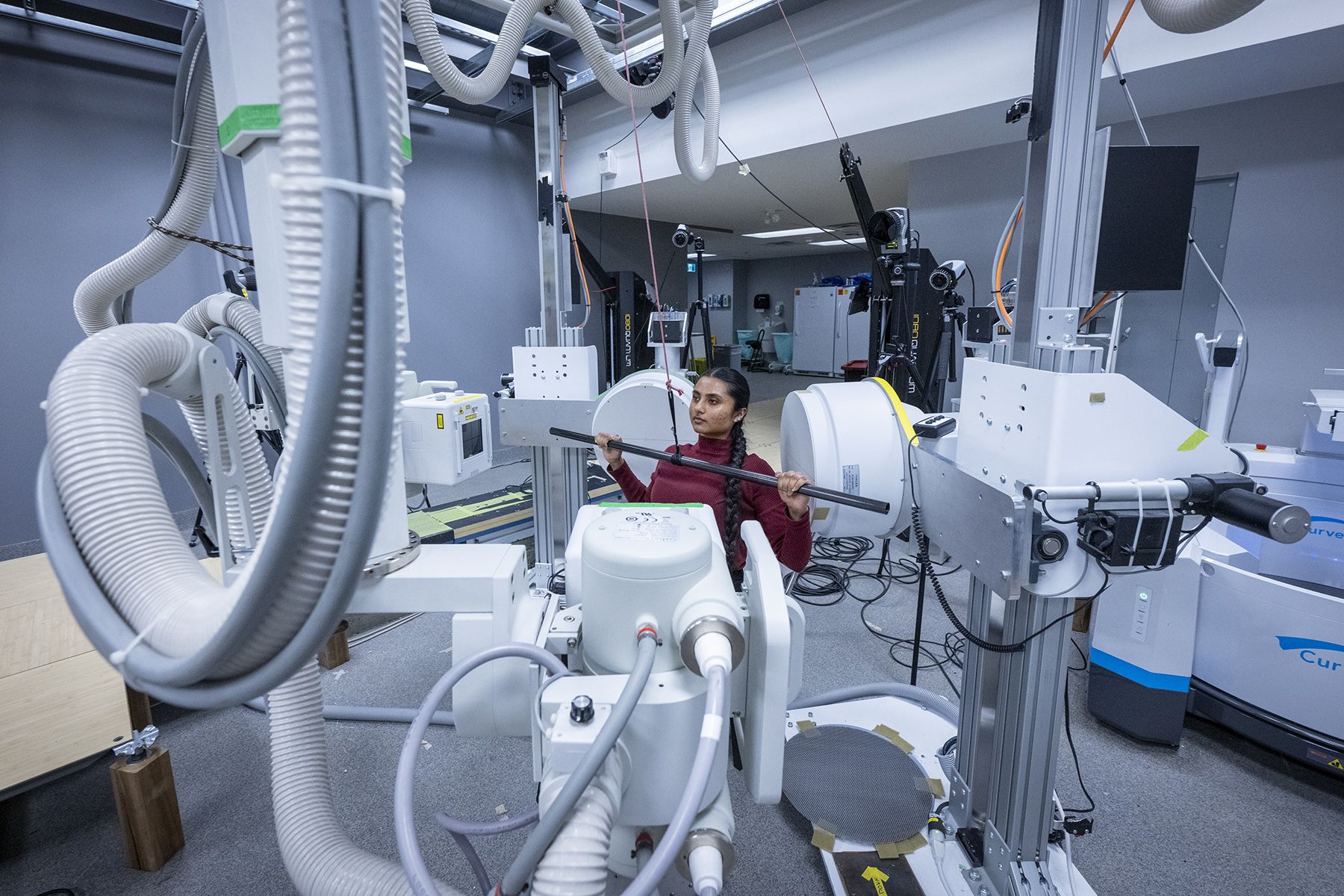 A Queen's student demonstrates how the BVR was used to measure shoulder movement