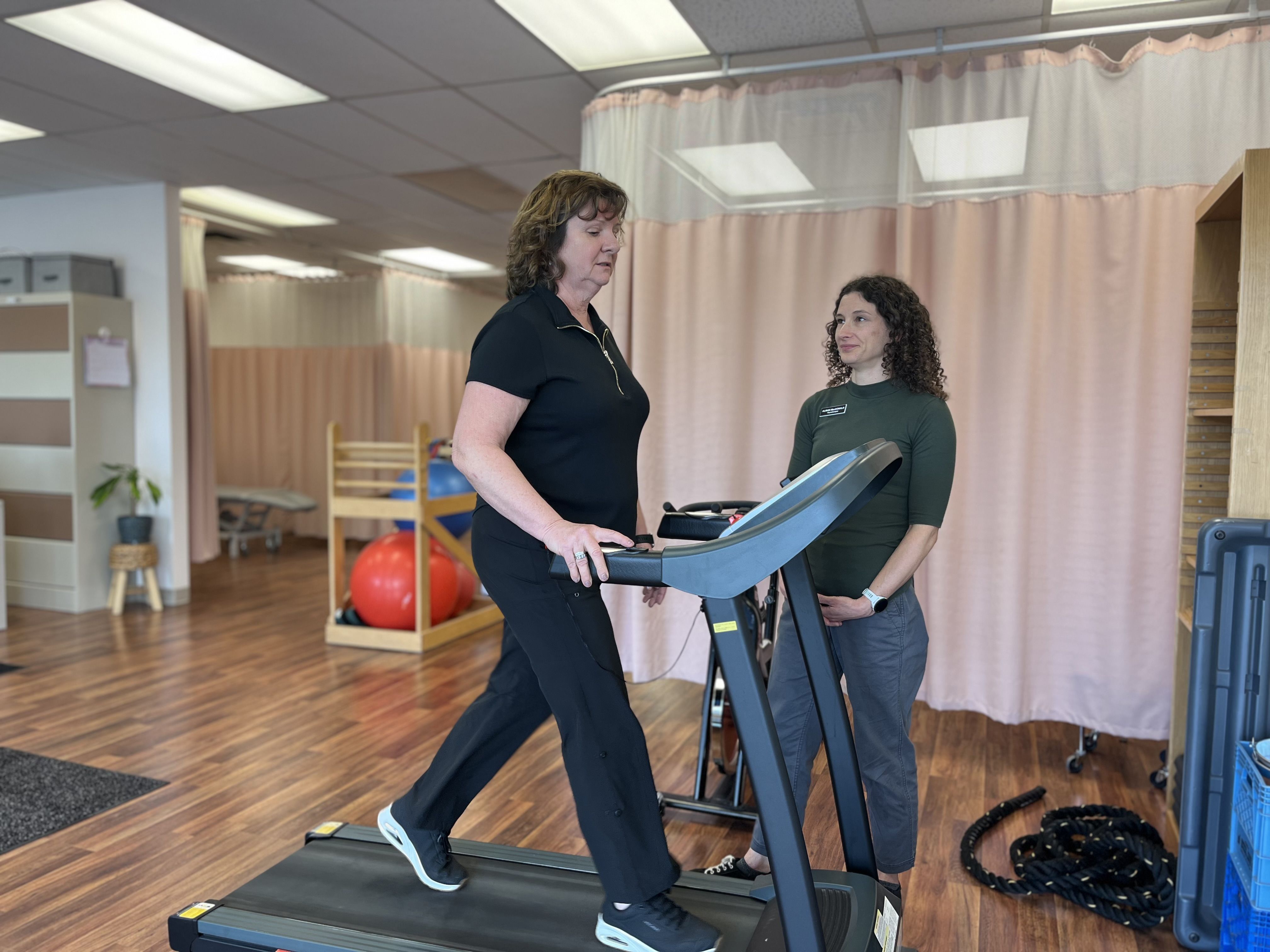 Local patient Terri works with her physiotherapist as part of the trial